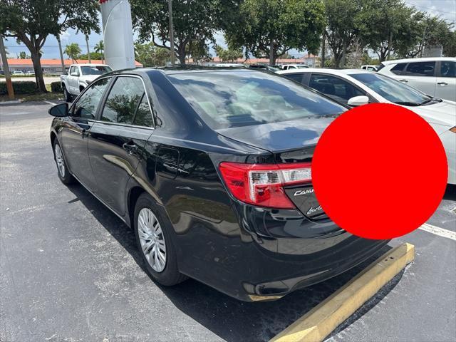 used 2013 Toyota Camry car, priced at $10,900
