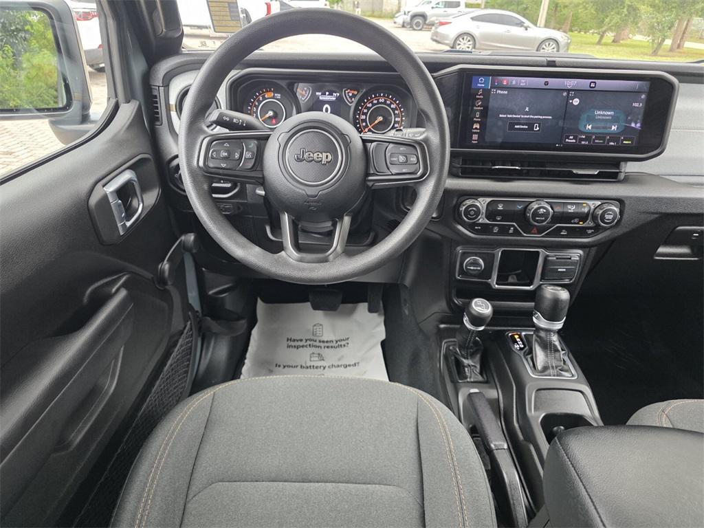 used 2024 Jeep Wrangler car, priced at $29,974