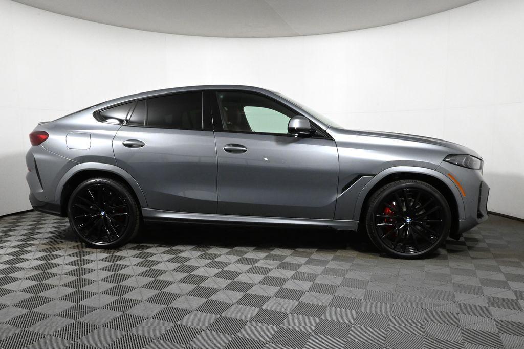 new 2025 BMW X6 car, priced at $86,955