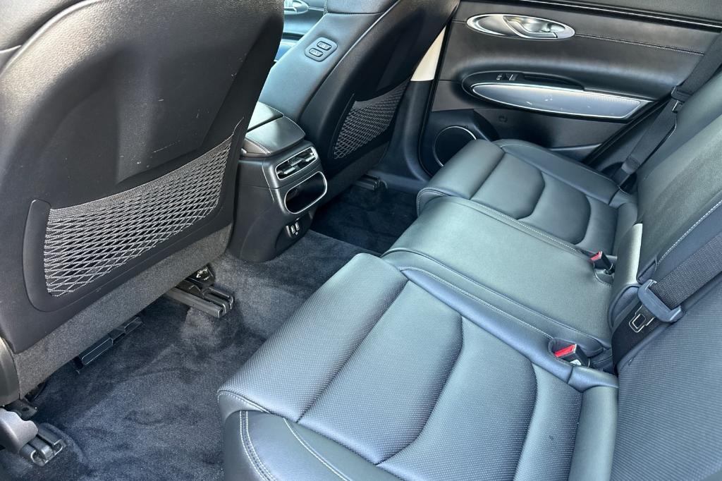 used 2023 Genesis GV70 car, priced at $35,556