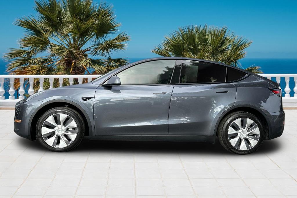 used 2023 Tesla Model Y car, priced at $32,104