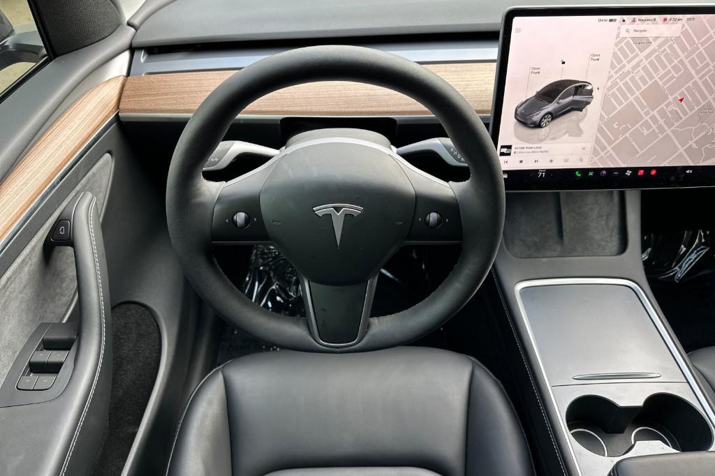 used 2023 Tesla Model Y car, priced at $32,104