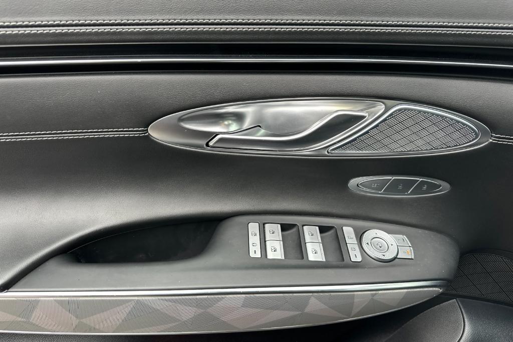used 2023 Genesis GV70 car, priced at $45,291