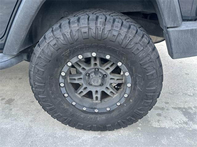 used 2018 Jeep Wrangler JK Unlimited car, priced at $19,999