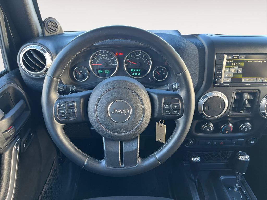 used 2013 Jeep Wrangler Unlimited car, priced at $16,791