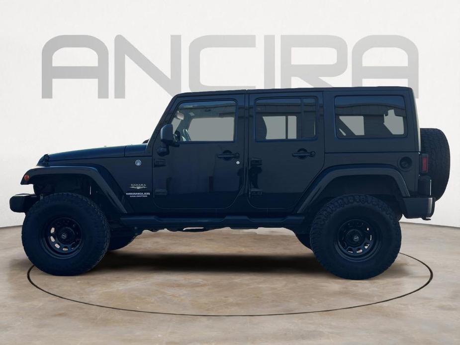 used 2013 Jeep Wrangler Unlimited car, priced at $16,791