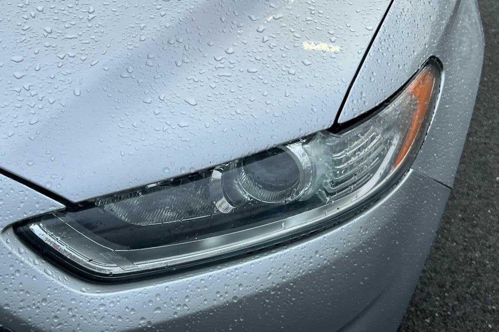 used 2016 Ford Fusion car, priced at $7,999