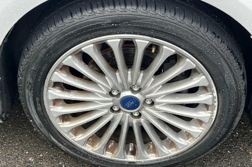 used 2016 Ford Fusion car, priced at $7,999