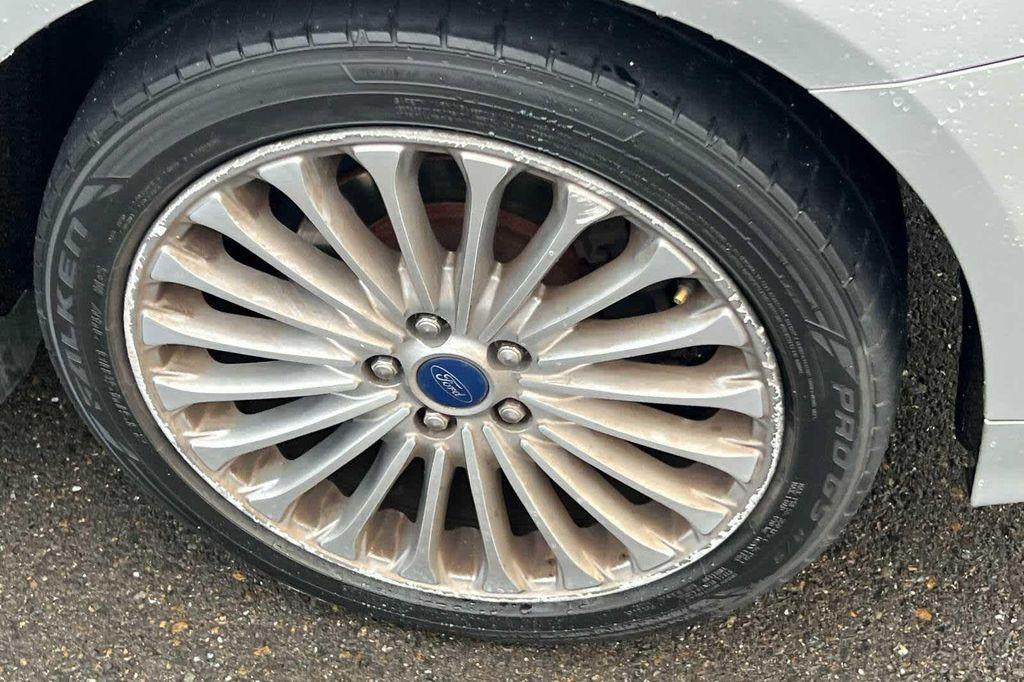 used 2016 Ford Fusion car, priced at $7,999