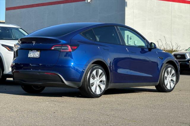 used 2024 Tesla Model Y car, priced at $33,977