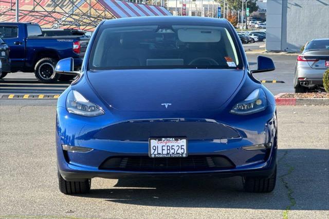 used 2024 Tesla Model Y car, priced at $33,977