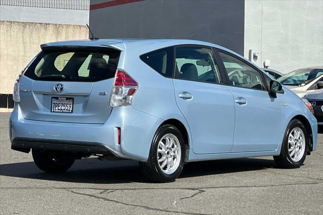 used 2015 Toyota Prius v car, priced at $9,999