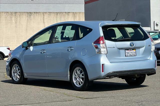 used 2015 Toyota Prius v car, priced at $9,999