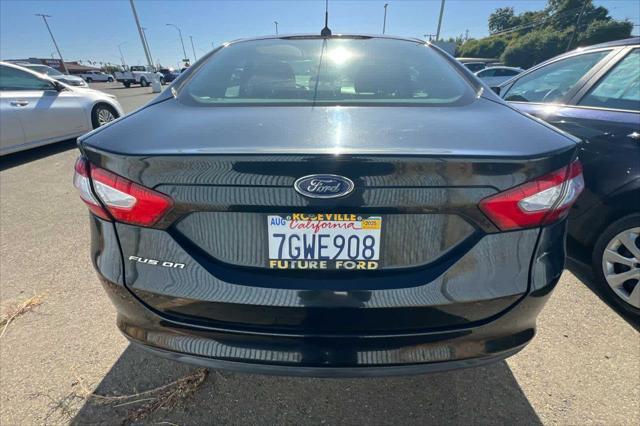 used 2015 Ford Fusion car, priced at $8,999