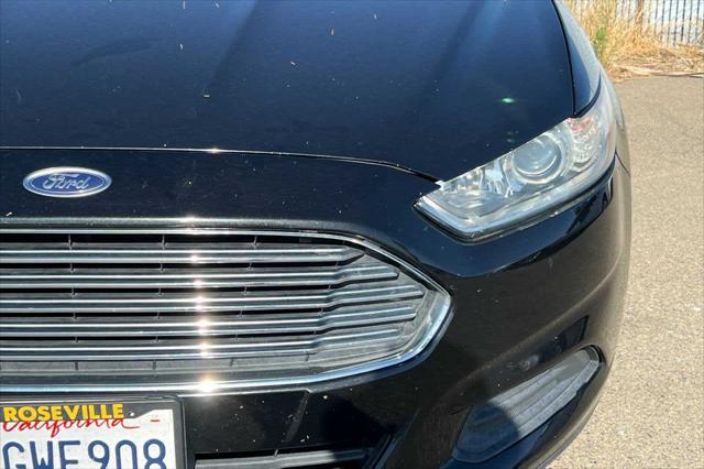 used 2015 Ford Fusion car, priced at $8,999