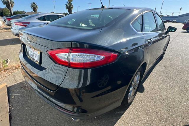 used 2015 Ford Fusion car, priced at $8,999