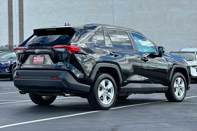 used 2021 Toyota RAV4 Hybrid car, priced at $27,999