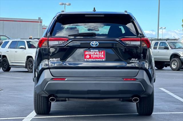 used 2021 Toyota RAV4 Hybrid car, priced at $27,999