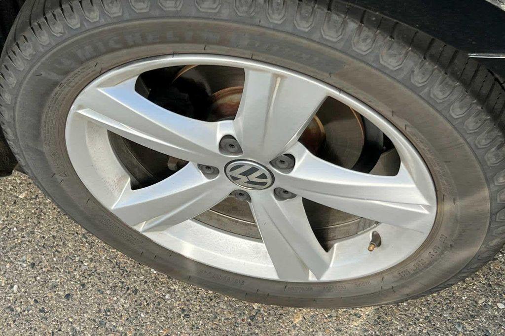 used 2014 Volkswagen Passat car, priced at $9,999