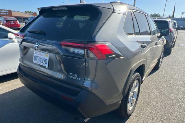 used 2021 Toyota RAV4 Hybrid car, priced at $27,999