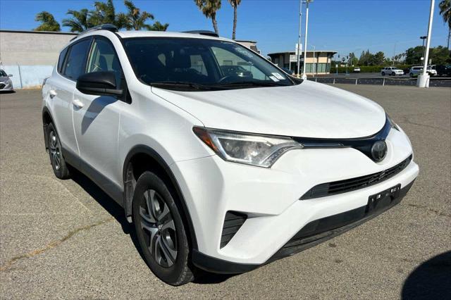 used 2018 Toyota RAV4 car, priced at $23,999