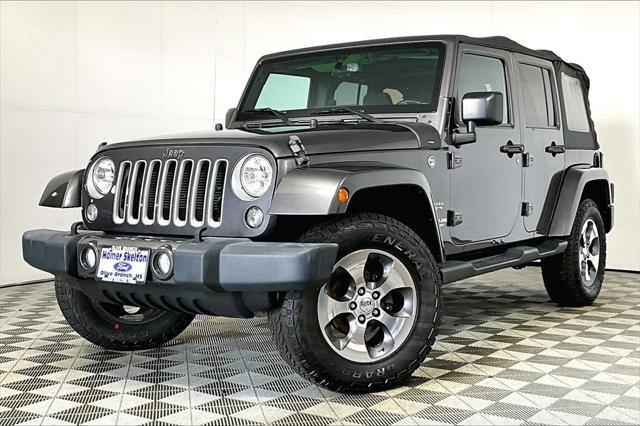 used 2016 Jeep Wrangler Unlimited car, priced at $24,641