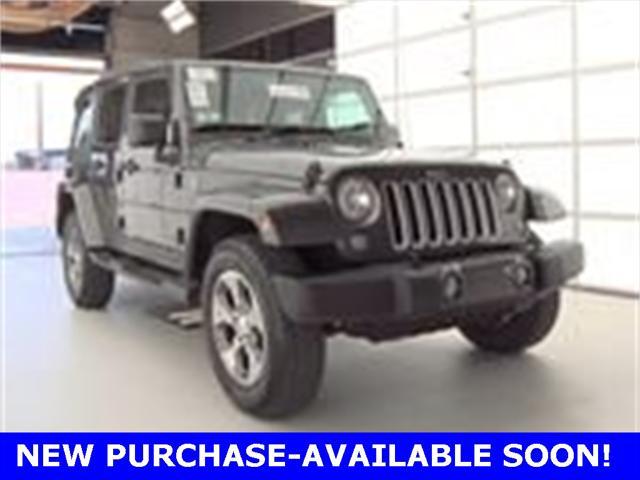 used 2016 Jeep Wrangler Unlimited car, priced at $27,241