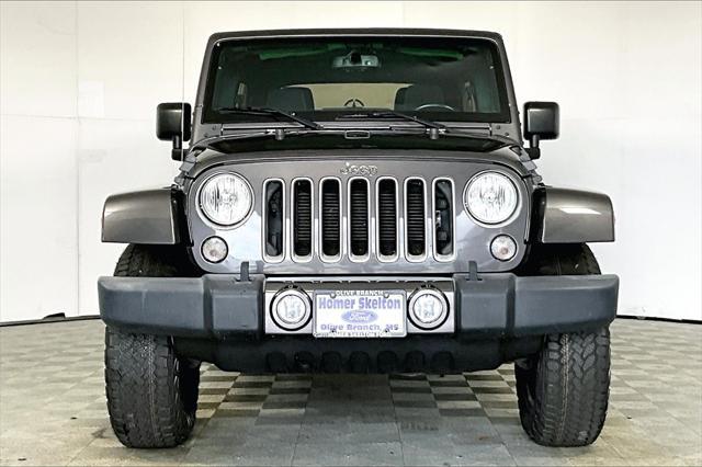 used 2016 Jeep Wrangler Unlimited car, priced at $24,641