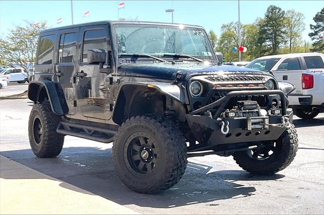 used 2015 Jeep Wrangler Unlimited car, priced at $26,891