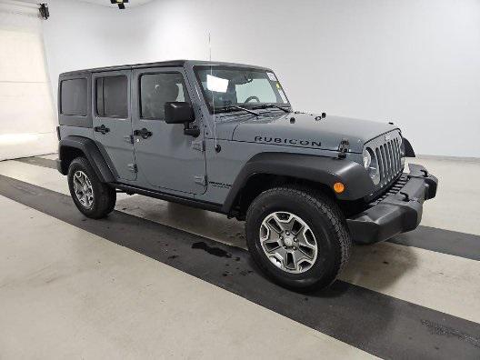 used 2014 Jeep Wrangler Unlimited car, priced at $23,941