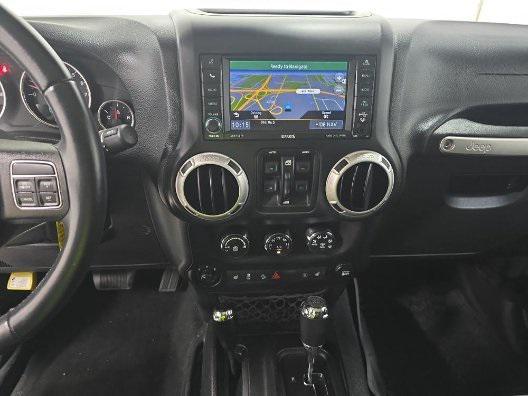 used 2014 Jeep Wrangler Unlimited car, priced at $23,941