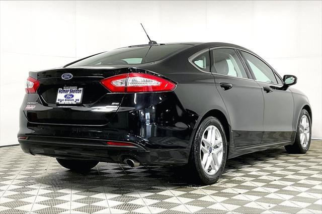 used 2016 Ford Fusion car, priced at $15,591