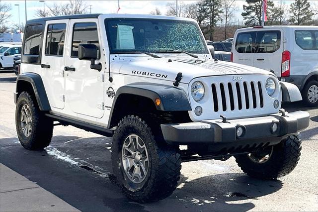 used 2016 Jeep Wrangler Unlimited car, priced at $27,941