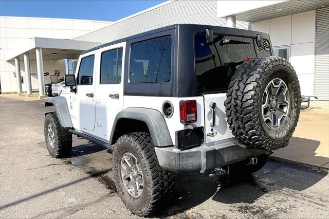 used 2016 Jeep Wrangler Unlimited car, priced at $27,941