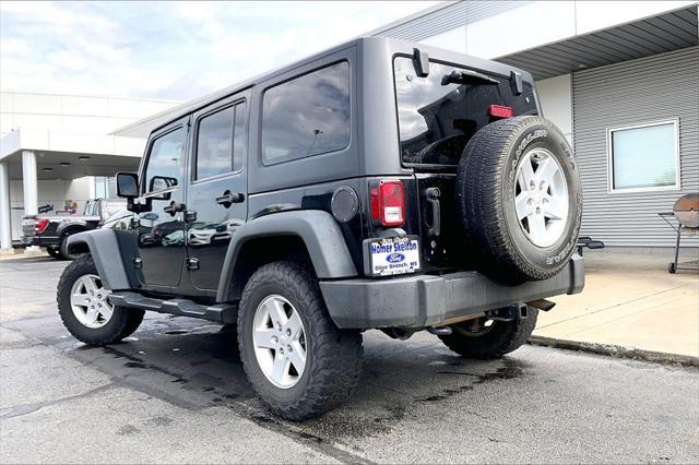 used 2014 Jeep Wrangler Unlimited car, priced at $17,241