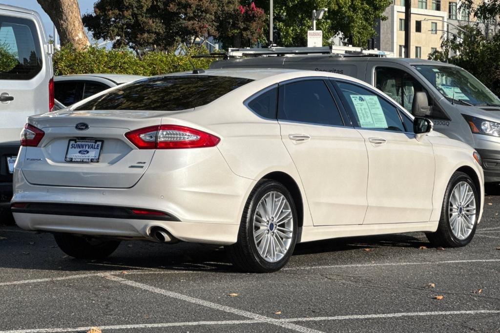 used 2016 Ford Fusion car, priced at $10,495