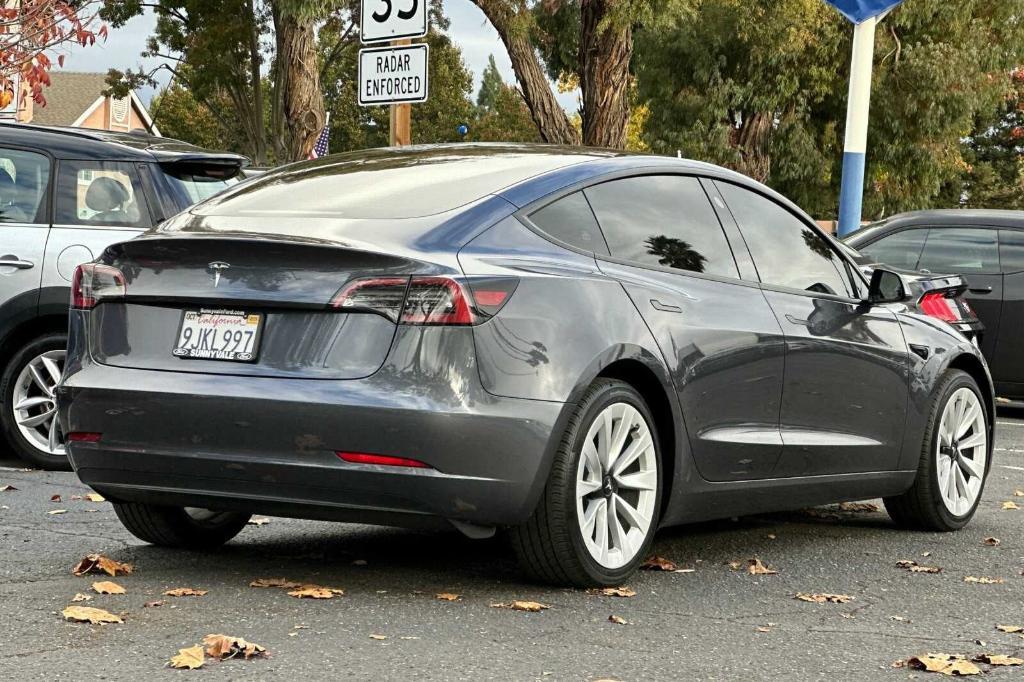 used 2023 Tesla Model 3 car, priced at $25,995