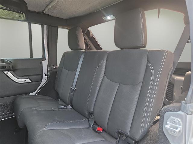 used 2016 Jeep Wrangler Unlimited car, priced at $16,577