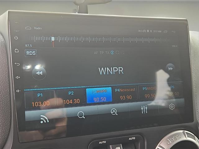 used 2016 Jeep Wrangler Unlimited car, priced at $16,577
