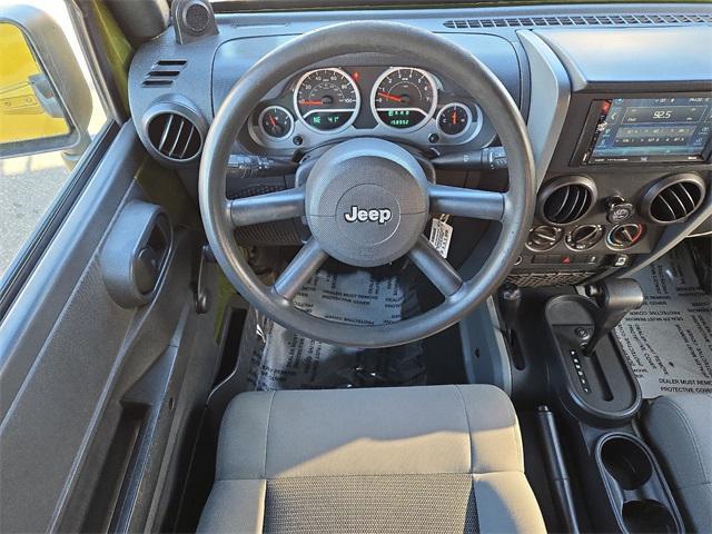 used 2010 Jeep Wrangler Unlimited car, priced at $9,977