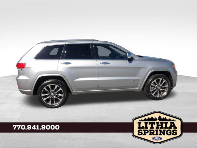 used 2014 Jeep Grand Cherokee car, priced at $9,852
