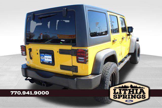 used 2015 Jeep Wrangler Unlimited car, priced at $17,490