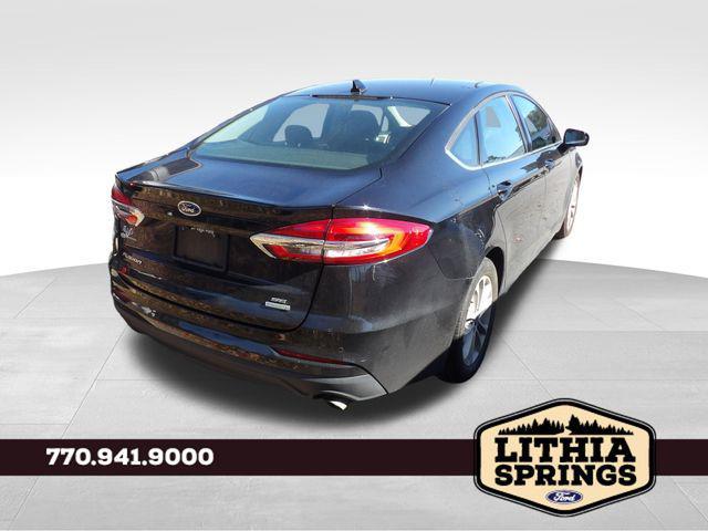 used 2019 Ford Fusion car, priced at $13,990