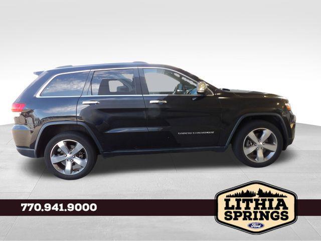 used 2014 Jeep Grand Cherokee car, priced at $11,319