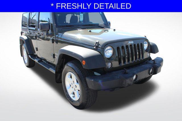 used 2015 Jeep Wrangler Unlimited car, priced at $13,599