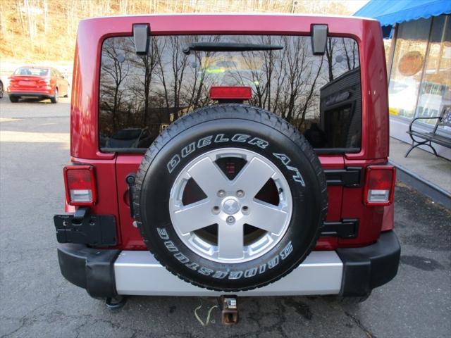 used 2011 Jeep Wrangler Unlimited car, priced at $12,900