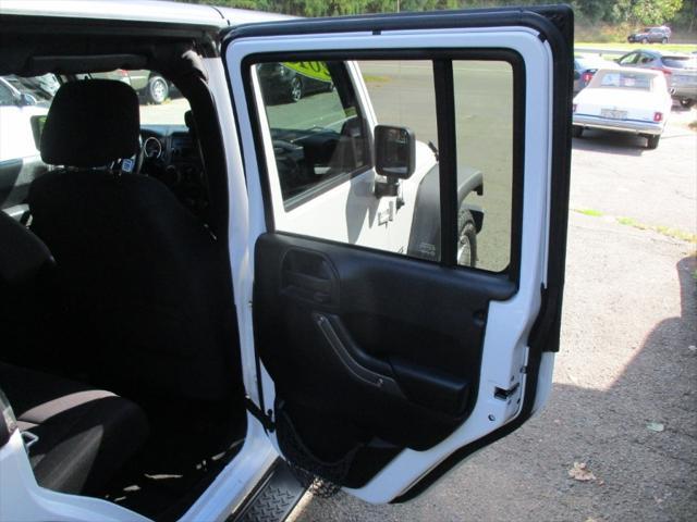 used 2013 Jeep Wrangler Unlimited car, priced at $11,495