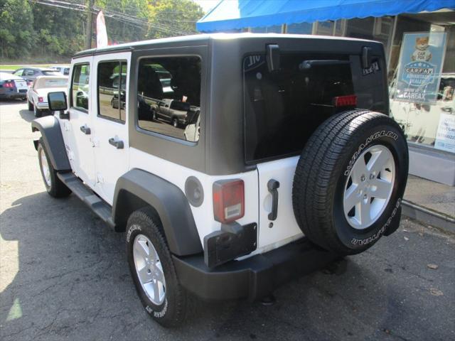 used 2013 Jeep Wrangler Unlimited car, priced at $11,495