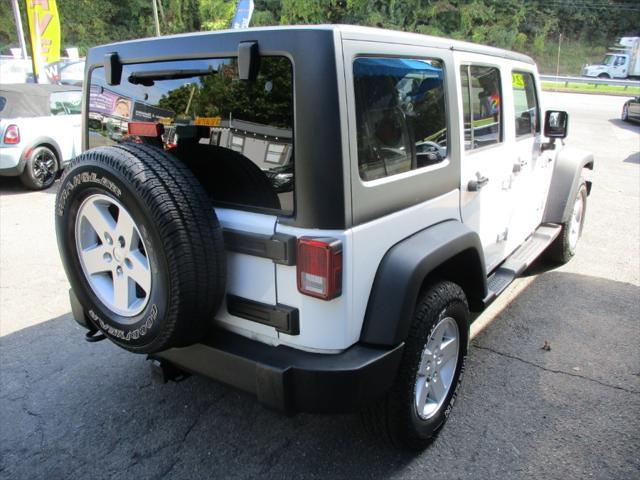 used 2013 Jeep Wrangler Unlimited car, priced at $11,495