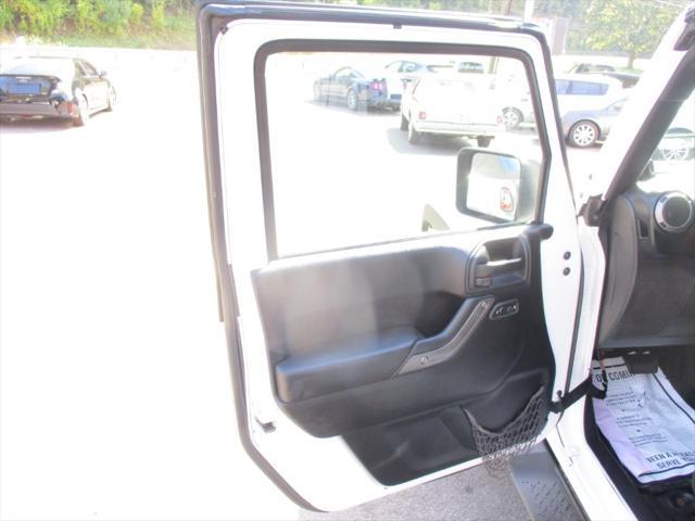 used 2013 Jeep Wrangler Unlimited car, priced at $11,495